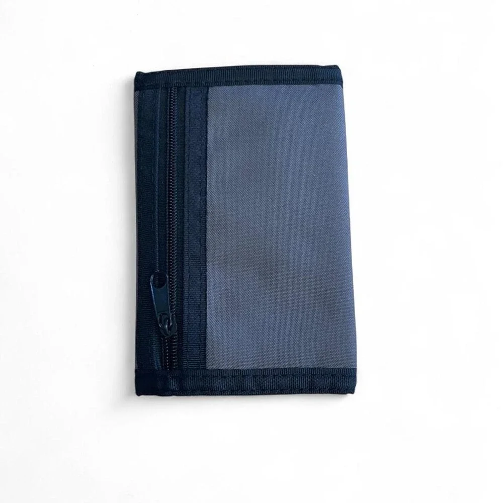 Nintendo NES controller wallet trifold with gray mesh panel and black zipper